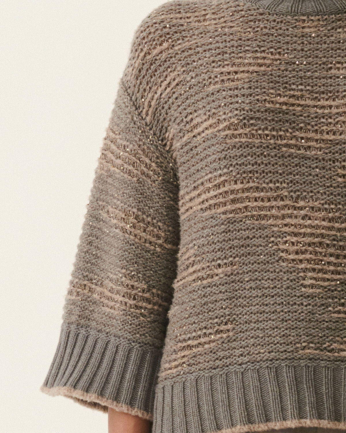Taupe knit sweater with subtle gold sequin stripe detail and ribbed cuffs