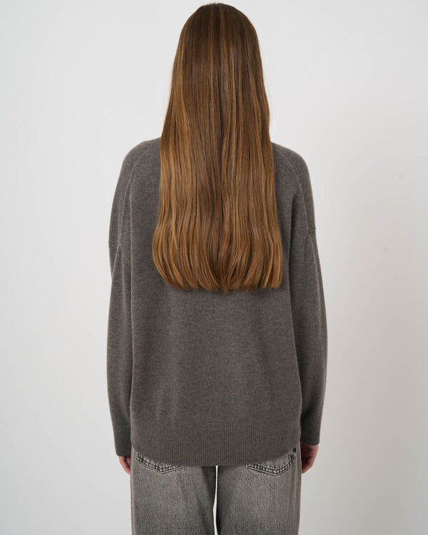 Oversized gray cashmere V-neck sweater back view with raglan sleeves