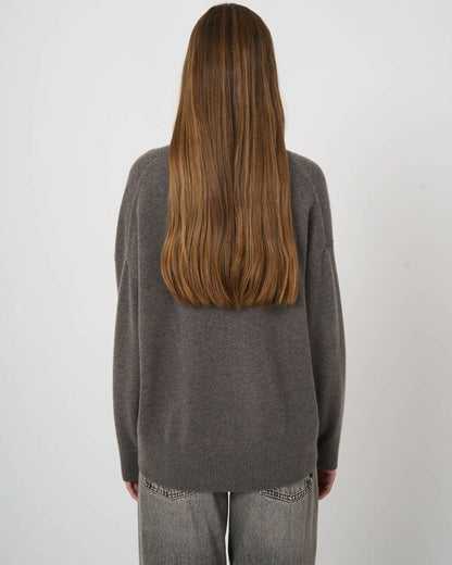 Oversized gray cashmere V-neck sweater back view with raglan sleeves