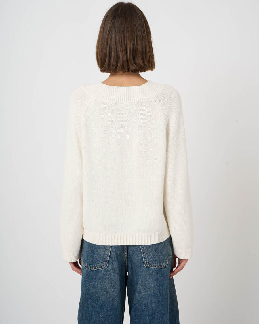 Repeat Cashmere cropped cream cotton-cashmere crew neck sweater, back view, with jeans