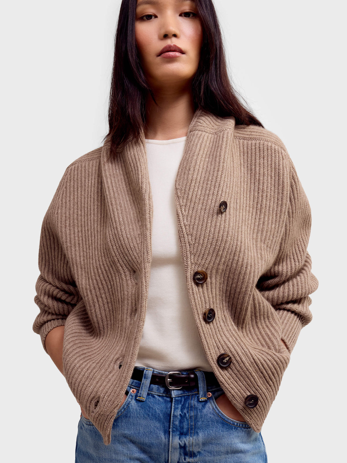 Model wearing Begg x Co Mini Yacht Cardigan in Brown Undyed with jeans