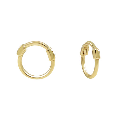 Two small gold thin huggie hoop earrings displayed on white background