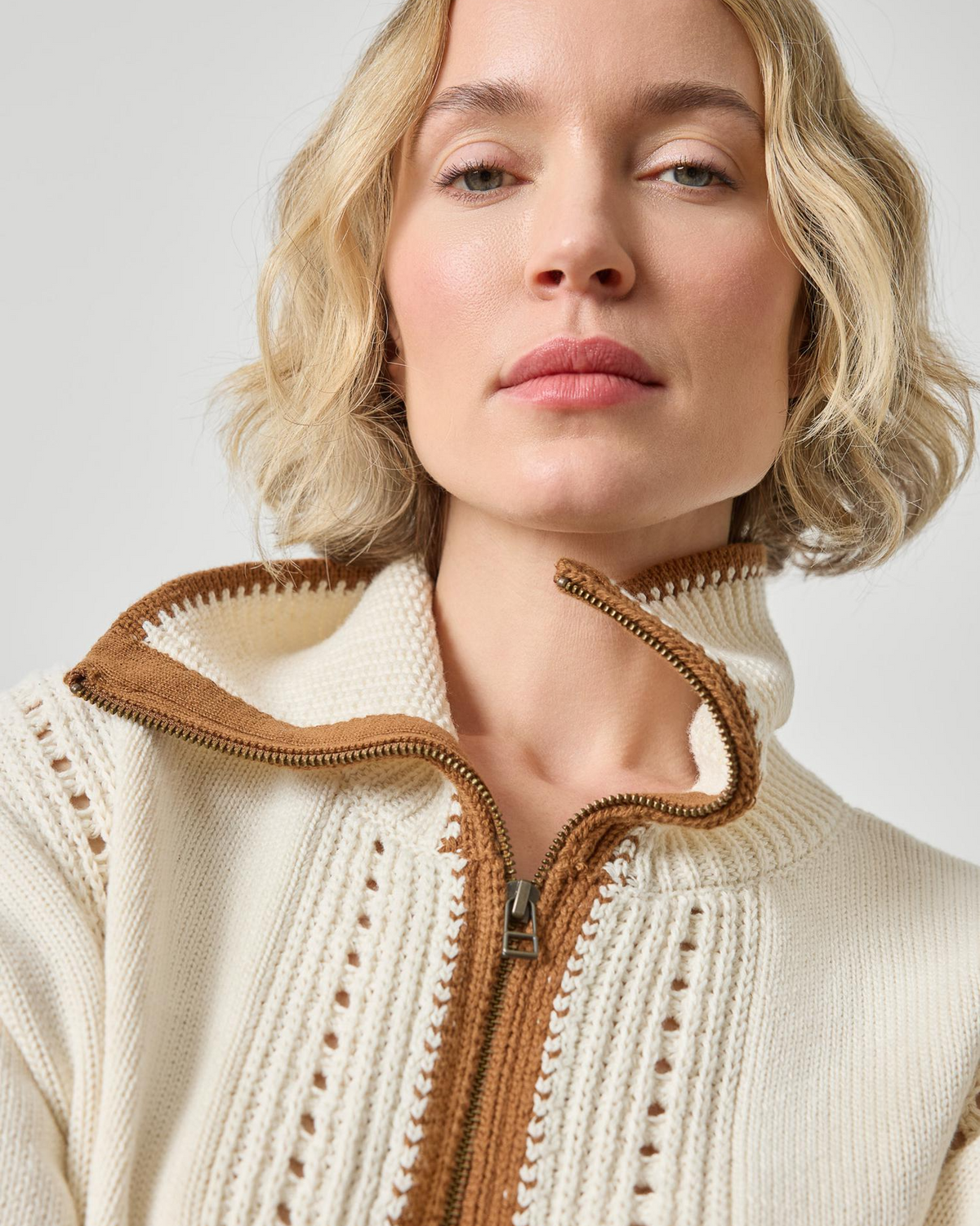 Cream pointelle knit zip cardigan with contrast brown collar trim detail