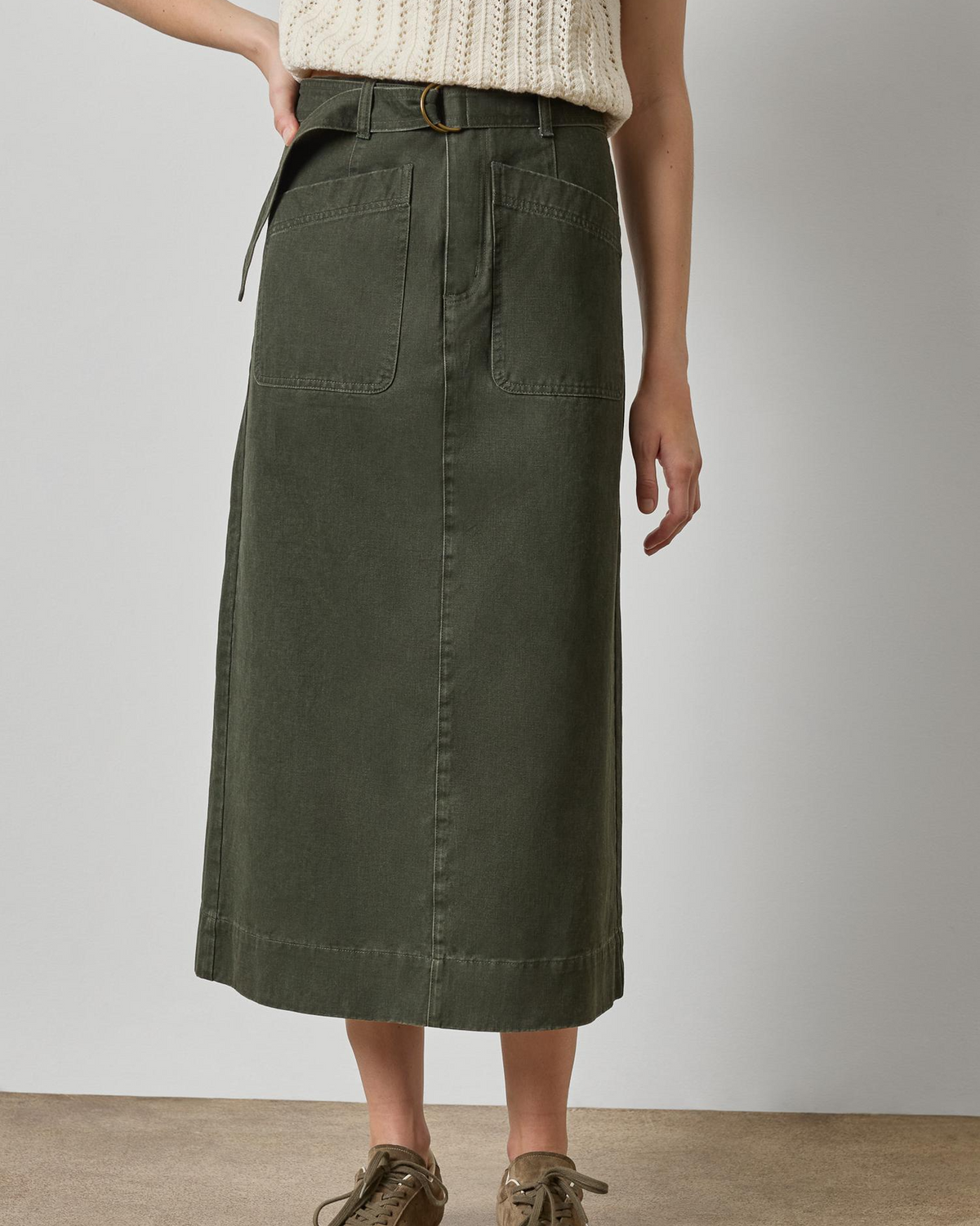 Olive green washed twill midi utility skirt with patch pockets and belt
