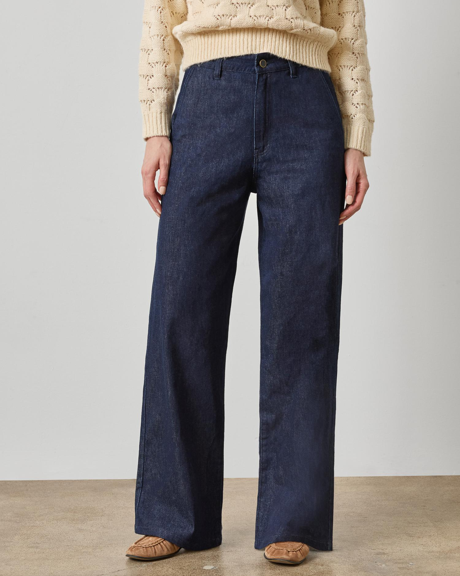Women's dark wash navy wide-leg denim trousers with high waist and clean front