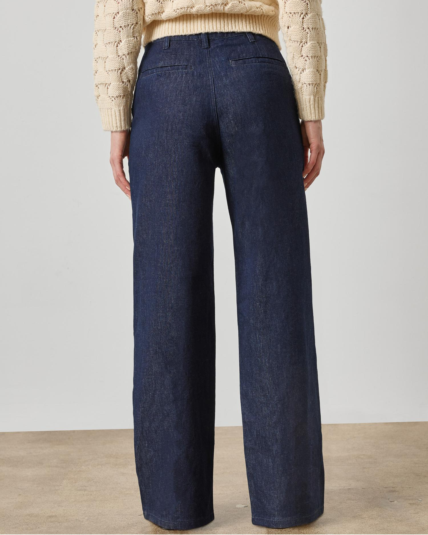Lilla P wide-leg dark wash blue denim trouser, back view, high waist
