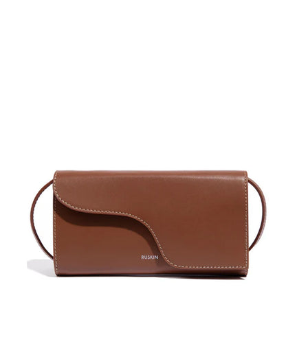Ruskin Petite Camille tan leather crossbody bag with wave flap and contrast stitching