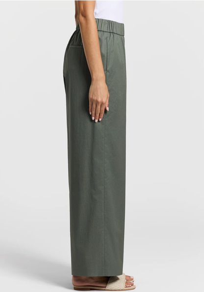 Stretch cotton light satin pants in Eucalyptus Green