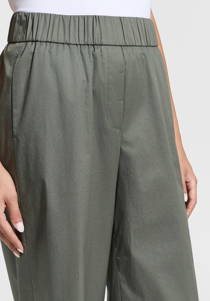 Stretch cotton light satin pants in Eucalyptus Green