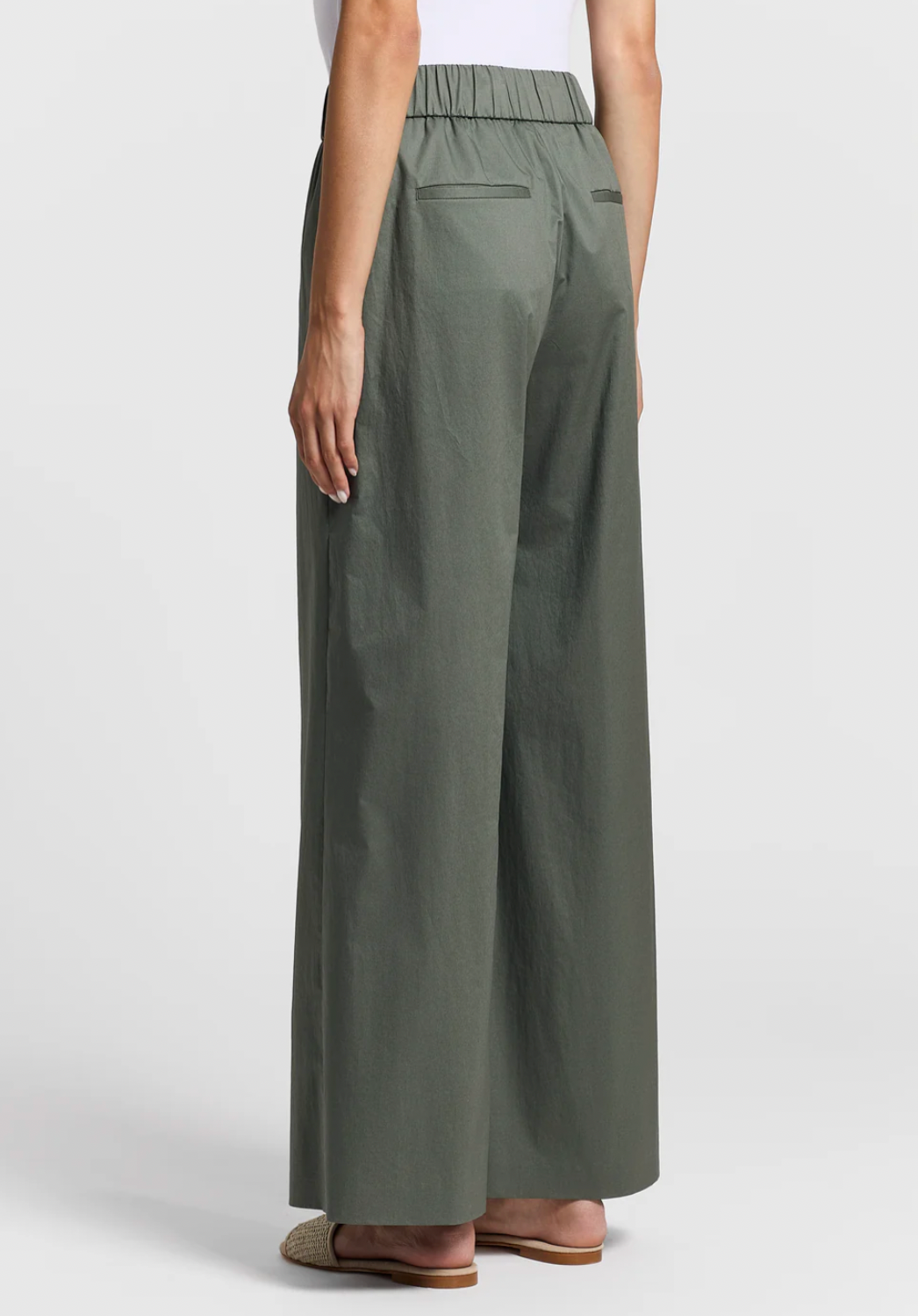 Stretch cotton light satin pants in Eucalyptus Green