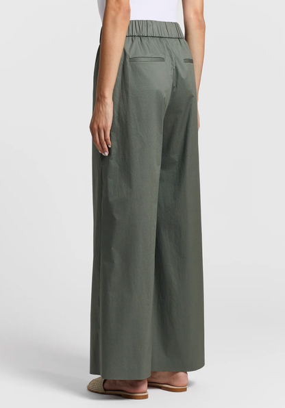 Stretch cotton light satin pants in Eucalyptus Green