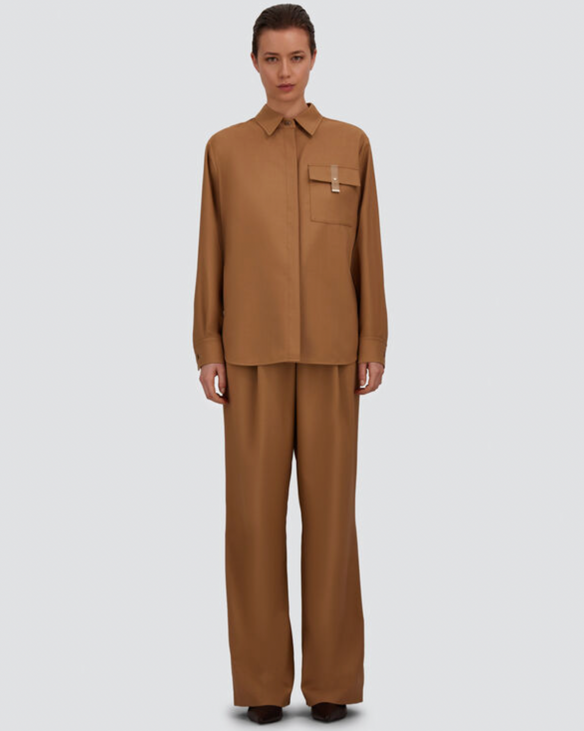 Herno fluid woolen wide-leg pants in camel, worn with matching shirt