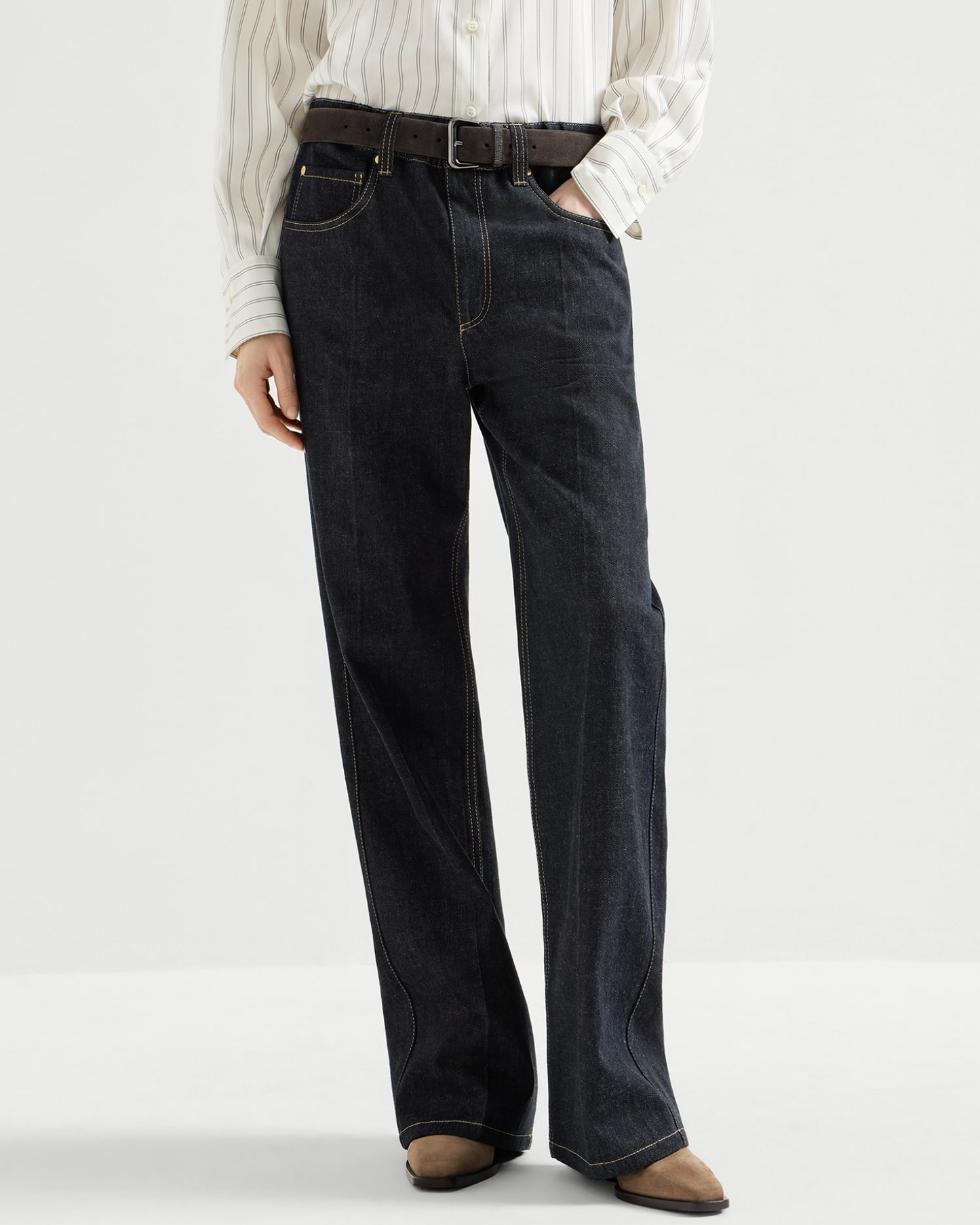 Brunello Cucinelli dark indigo wide-leg denim jeans with contrast stitching and leather belt
