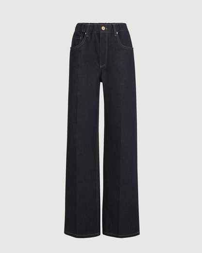 Brunello Cucinelli dark indigo wide-leg denim trousers with gold-tone button and contrast stitching