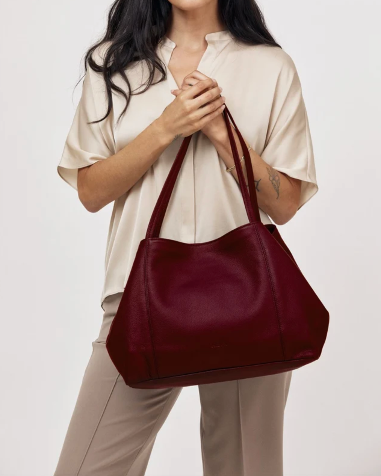 Orsyn Makena Tote in plum pebble grain leather with dual shoulder straps