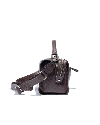 Dark brown pebbled leather crossbody bag with zipper top and adjustable strap
