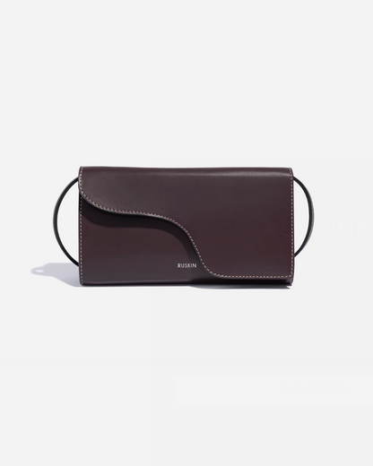 Ruskin Petite Camille clutch bag in dusty fig dark brown leather with ring strap