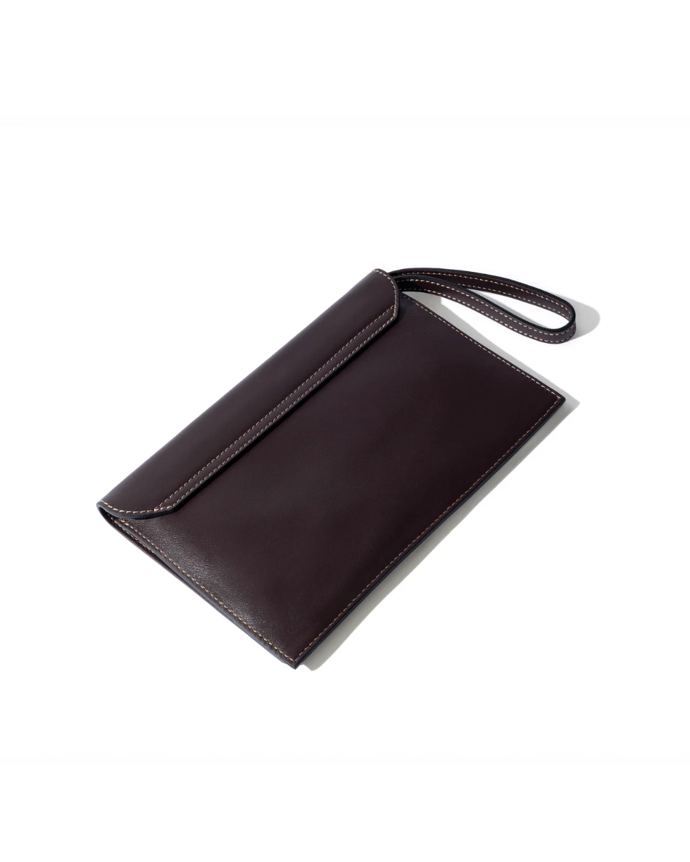 Dusty fig leather envelope clutch wristlet with contrast stitching and wrist strap