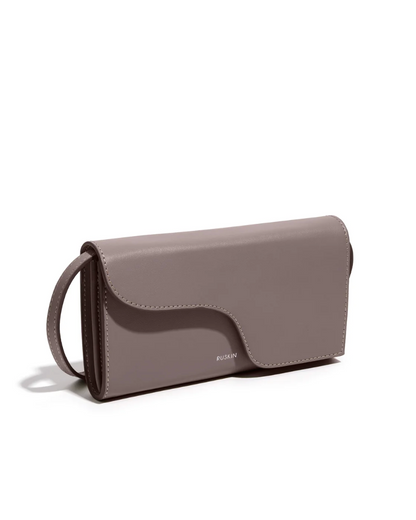 Ruskin England Petite Camille clutch bag in taupe leather with wave flap detail