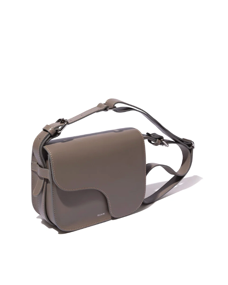 Ruskin England Camille Bag in taupe grey leather with crossbody strap and flap closure