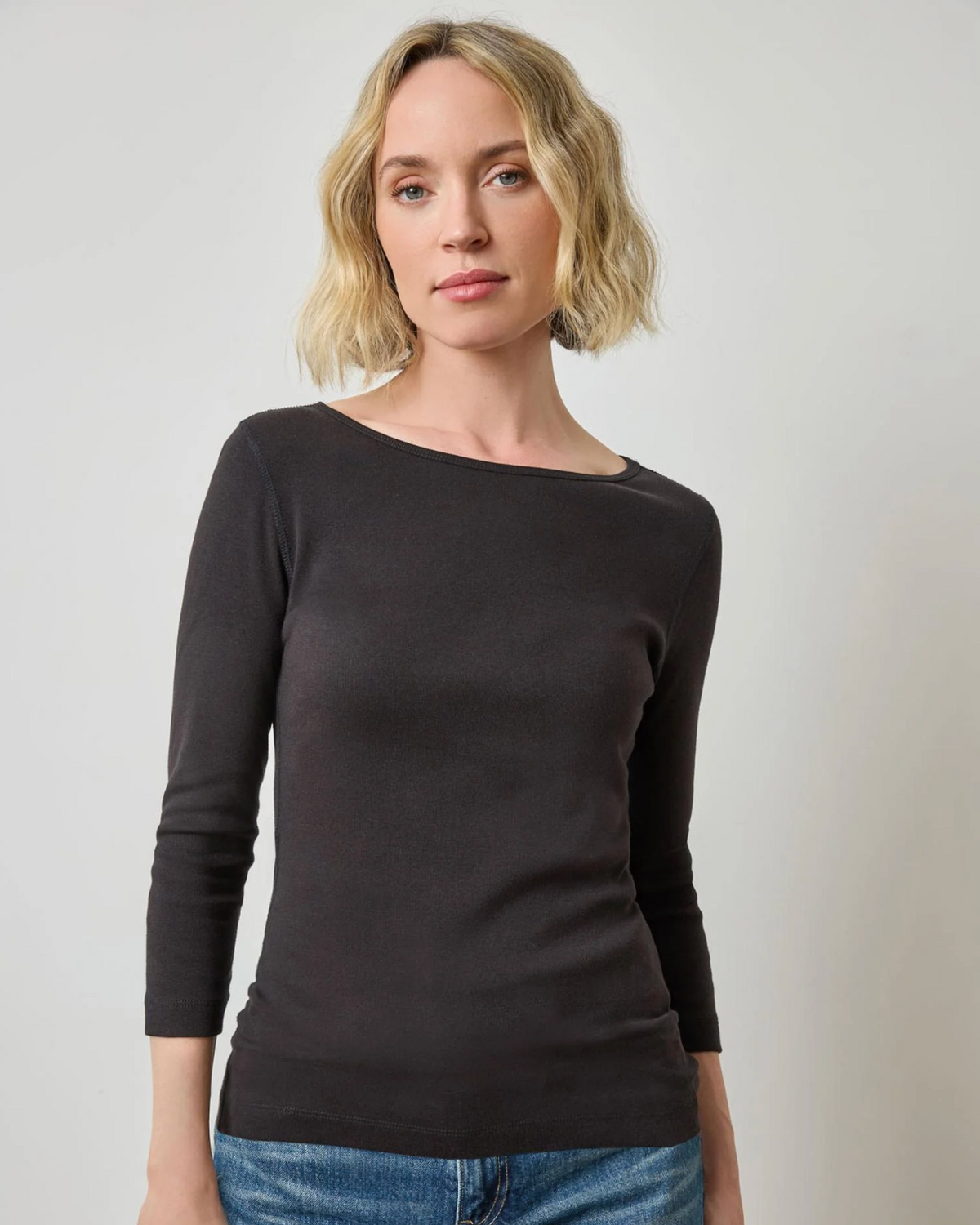 Lilla P black 3/4 sleeve boatneck fitted top paired with blue jeans