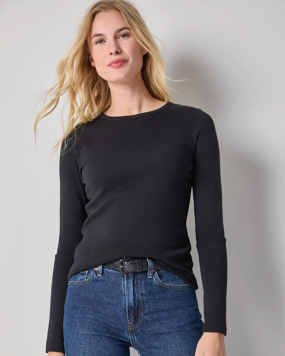 Lilla P black long sleeve fitted crew neck top with blue jeans