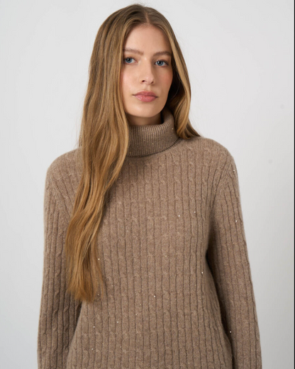 Sand cable-knit cashmere turtleneck sweater with subtle lurex detail, oversized fit