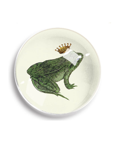 Crystal dome paperweight with crowned green frog prince illustration on cream background