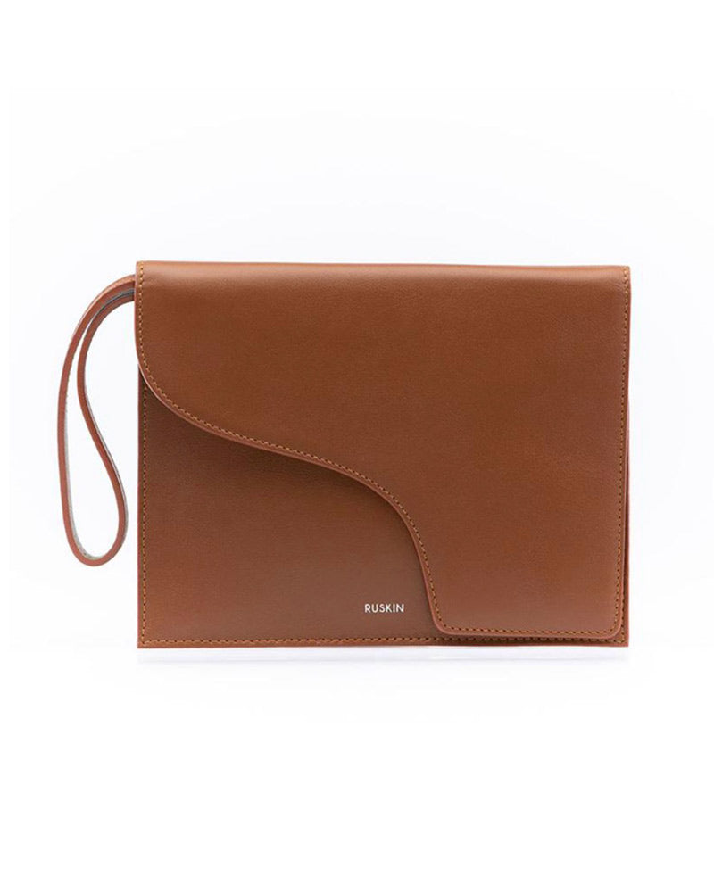 Ruskin Camille tan leather envelope clutch with wrist strap and curved flap detail