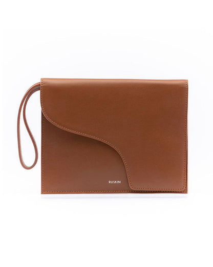 Ruskin Camille tan leather envelope clutch with wrist strap and curved flap detail